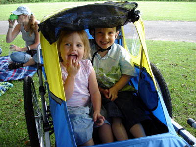 The trail-a-bike can hold both Joshua and Misha ...