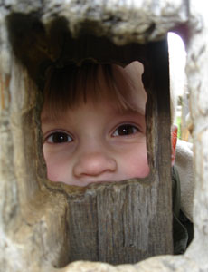 Joshua peeps through the keyhole of the castle gate